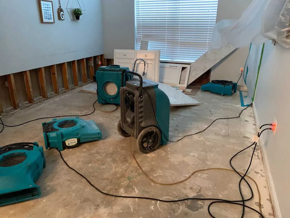 Dehumidifier in flood-cut room for Water Extraction & Removal in Fall River